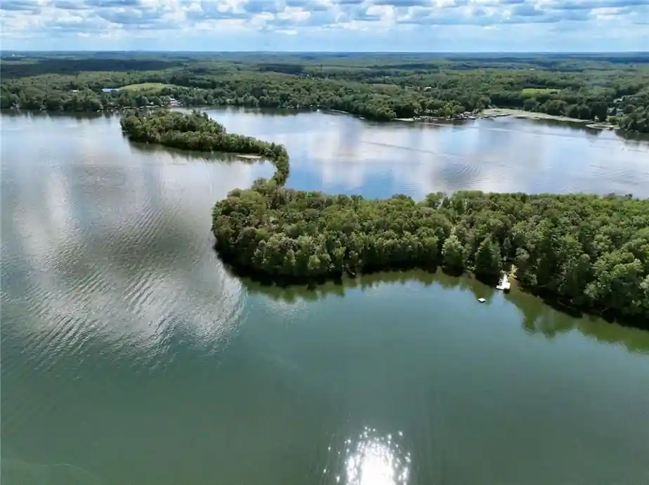 Aerial view of Long Lake, a wooded island and miles of forested shoreline
