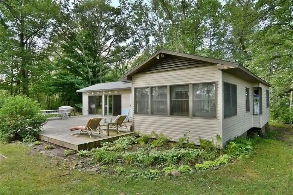 The Island Cabin on Long Lake with its screened porch and deck